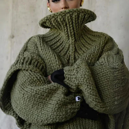 Women's chunky knit turtleneck sweater with stylish sleeves