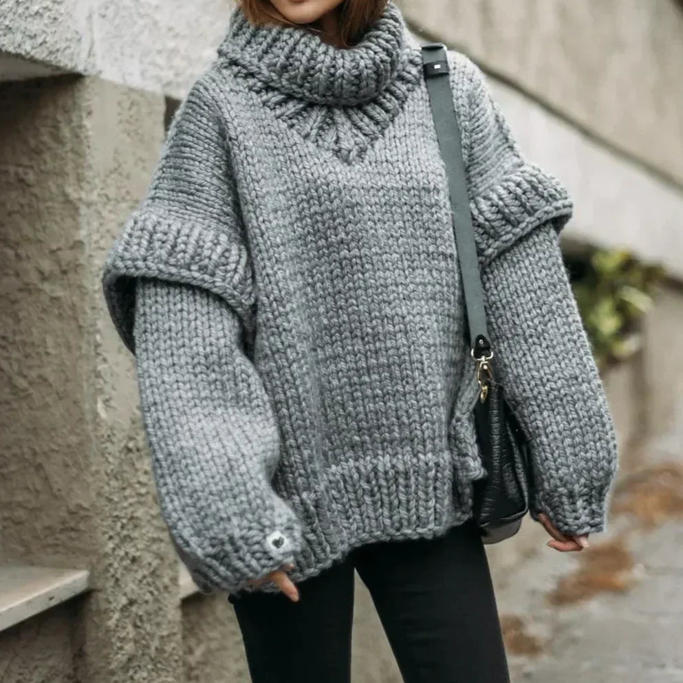 Women's chunky knit turtleneck sweater with stylish sleeves