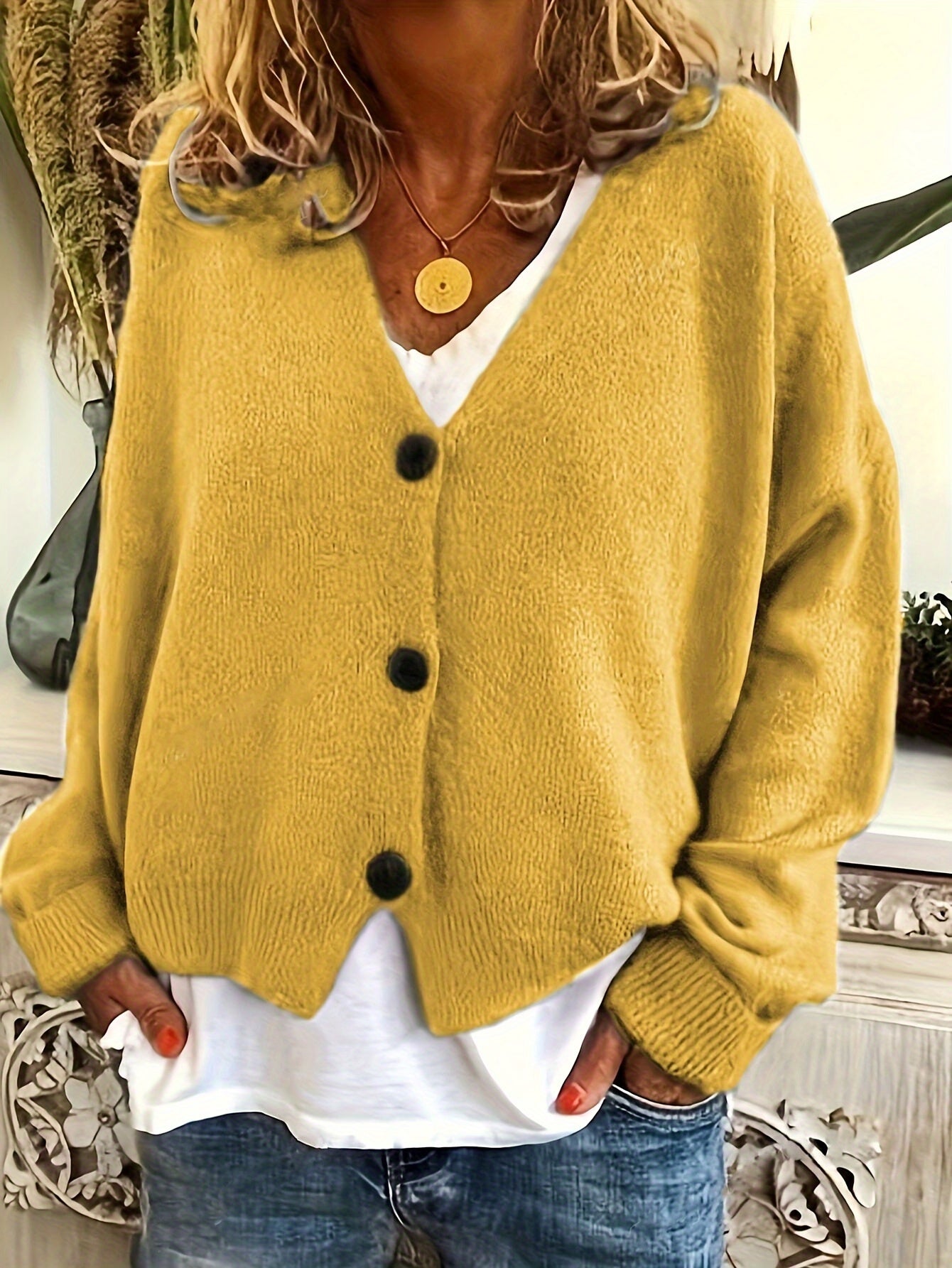 Button-front v-neck knitted cardigan sweater with long sleeves for women