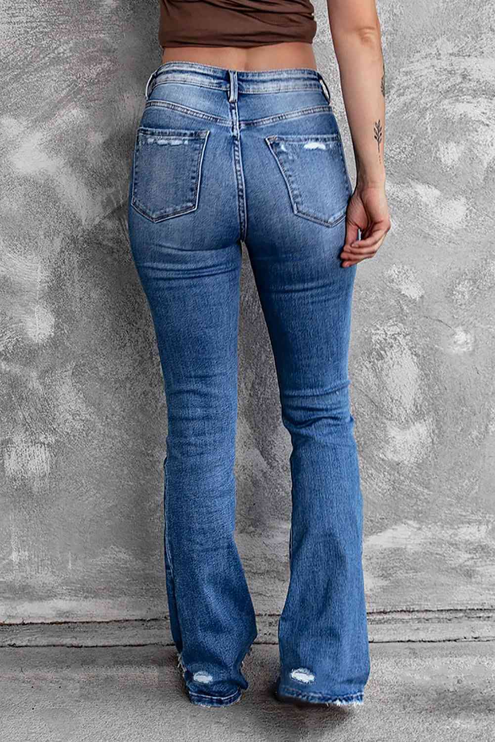 Kamaria -  distressed flared jeans with pockets