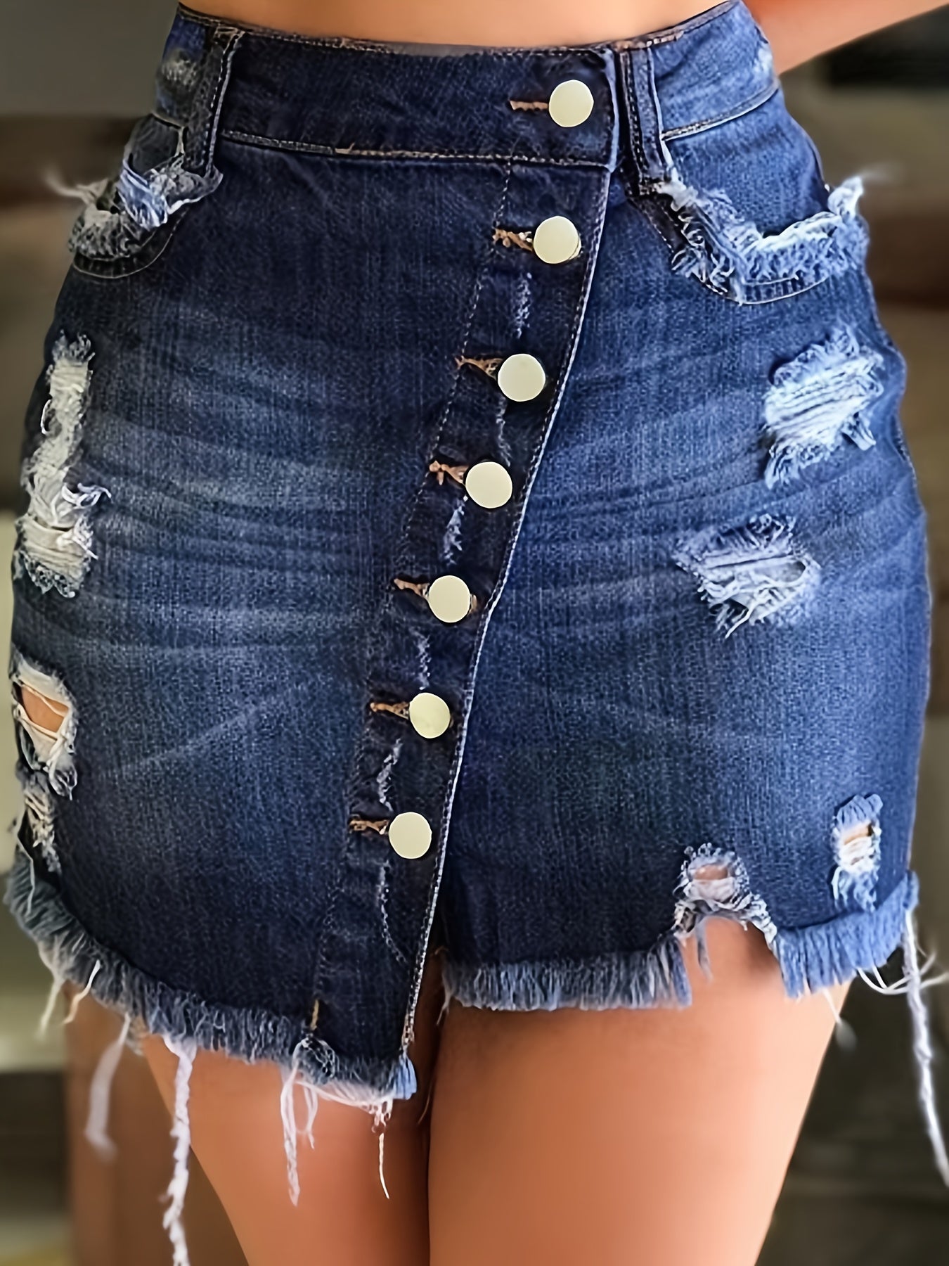 High-waist distressed denim mini skirt with button detail for women