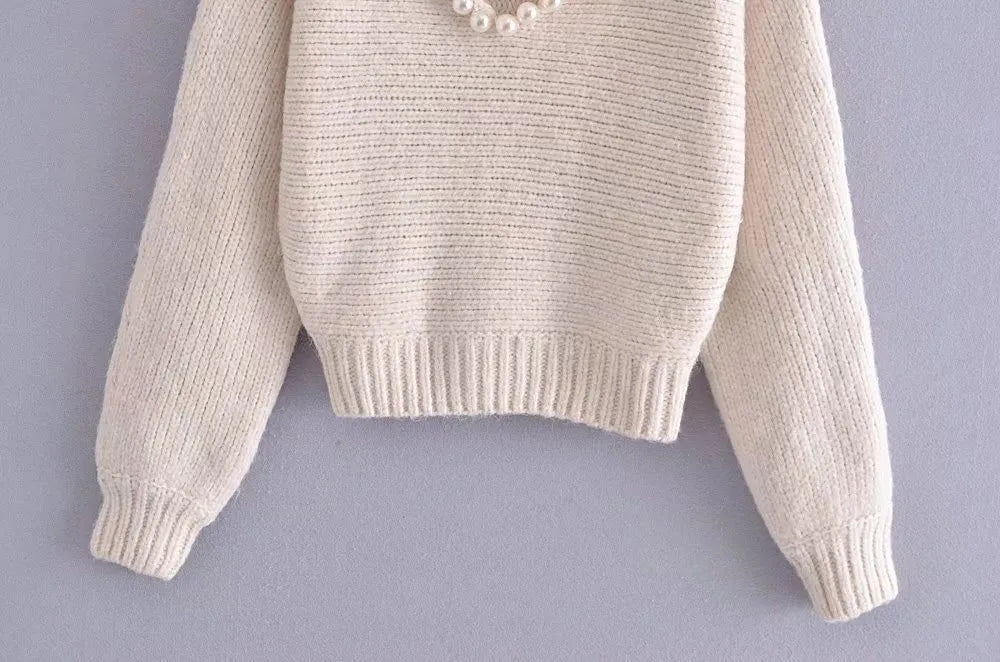 Women's faux pearl sweater