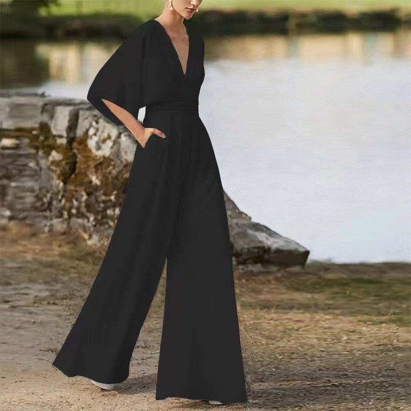 Women's Jumpsuit - Wide-Leg Flowy Fit - Deep V-Neck - Three-Quarter Sleeves - Elegant Waist