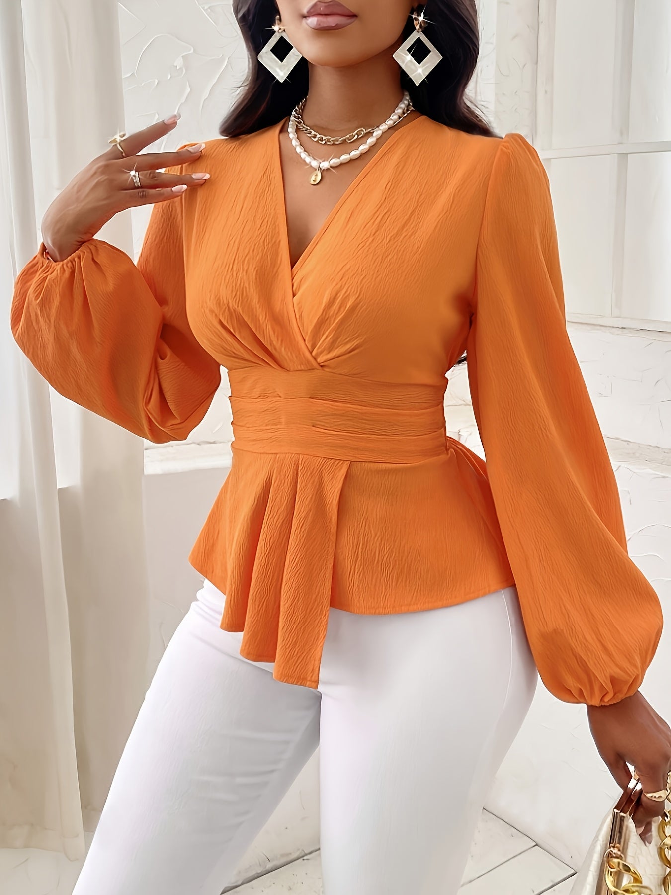 Orange v-neck long-sleeved peplum top for women