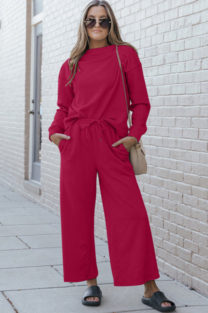 Women's textured long sleeve top and drawstring pants set