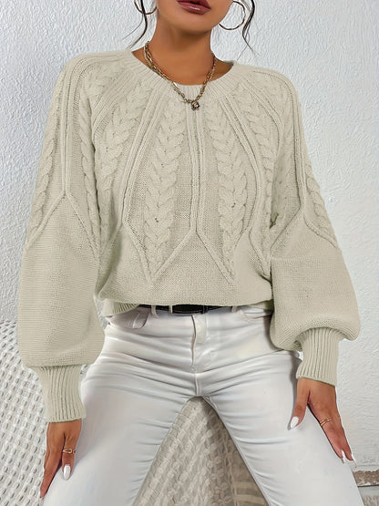 Women's round neck knitted pullover with cable pattern