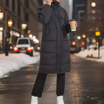 Long women's puffer jacket with high lapel