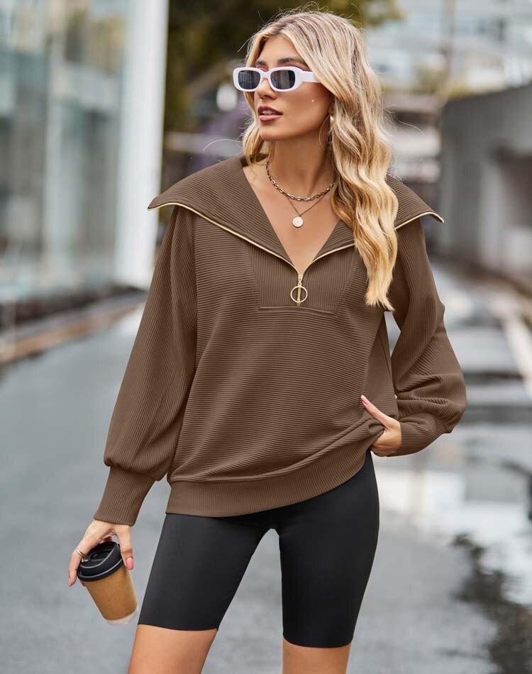 Women's pullover sweater with zip neckline