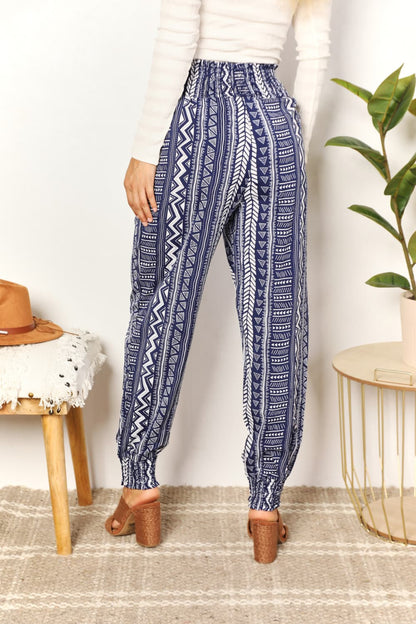 Womens geometric print high-rise tassel pants