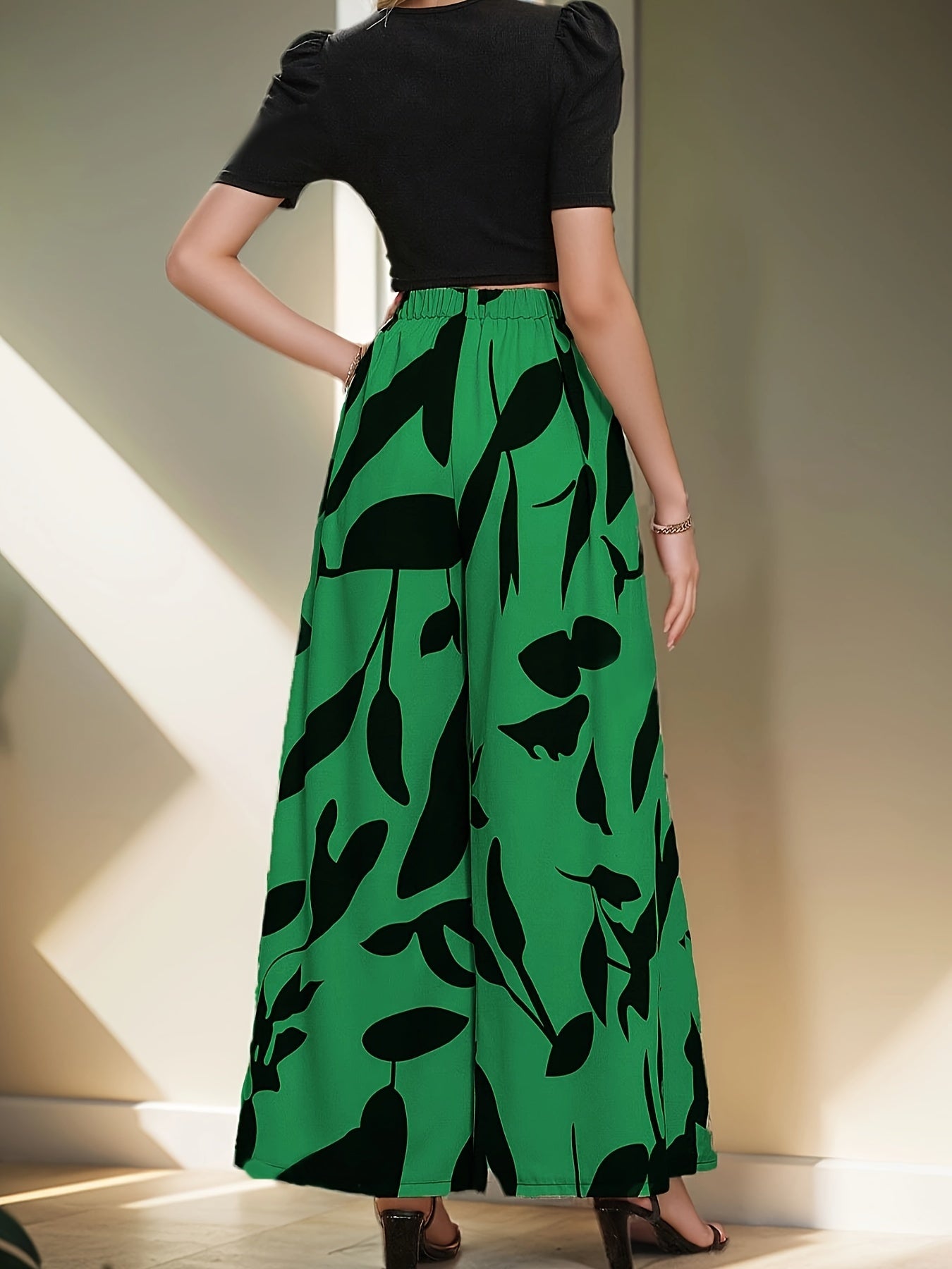 Elegant two-piece pantsuit set with floral wide-leg pants for women