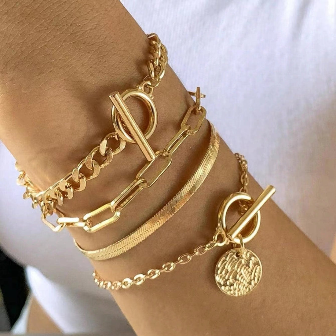 Gold layered bracelet set with coin charm