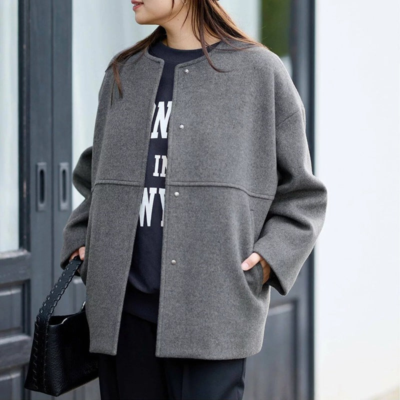 Minimalist oversized snap-button coat for women