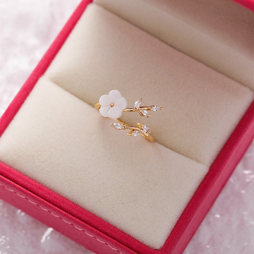 Adjustable white blossom ring