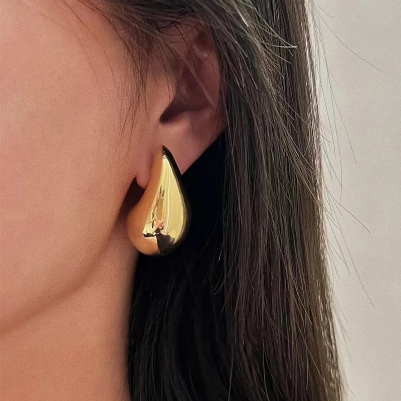 Elegant golden drop earrings with teardrop design