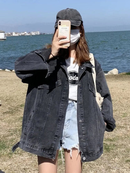 Women's long sleeve denim jacket with button closure