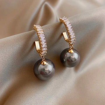 Elegant large pearl drop earrings