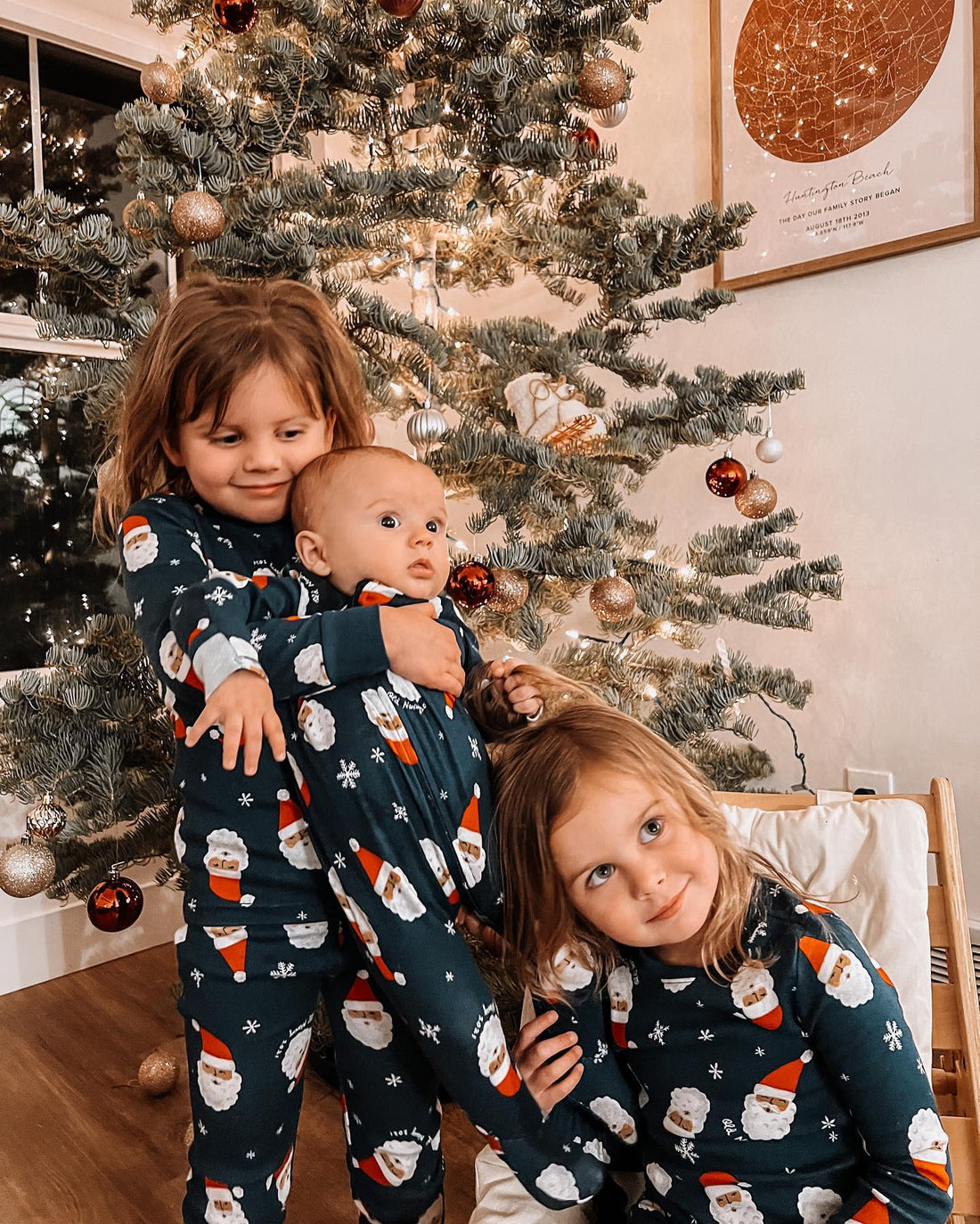 Family matching hooded pajama set with santa print