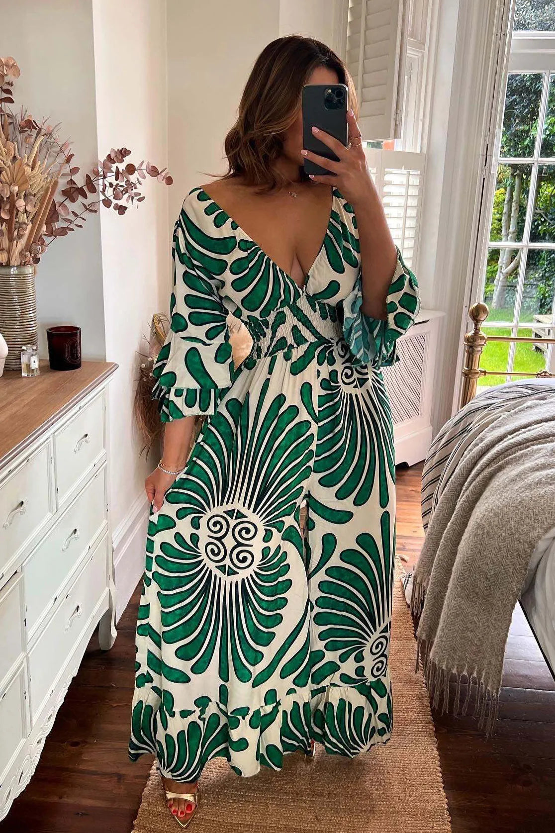 Women's vintage-style floral overall with flounce sleeves