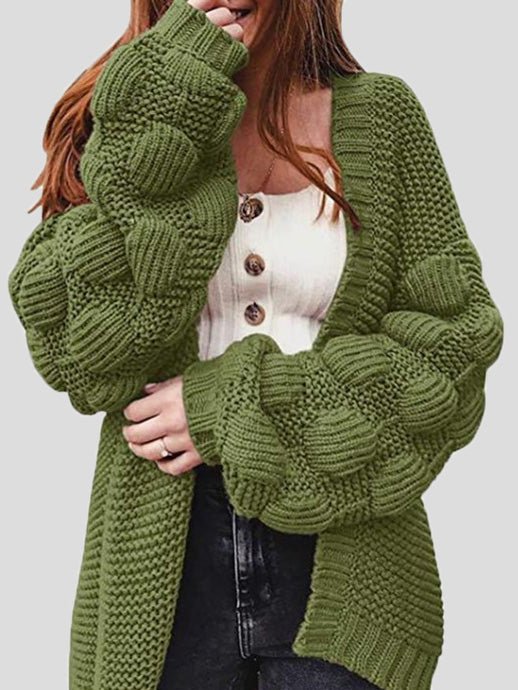 Women's chunky knit cardigan with pom pom sleeves and open front