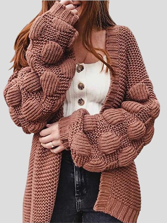 Women's chunky knit cardigan with pom pom sleeves and open front