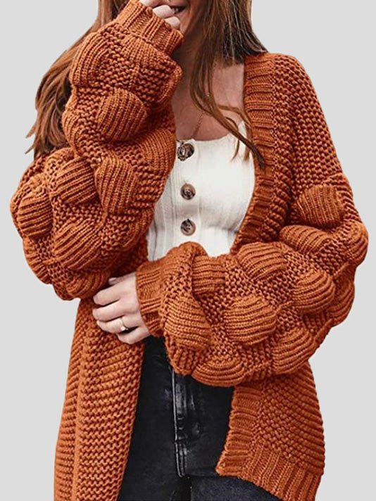 Women's chunky knit cardigan with pom pom sleeves and open front