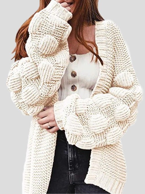 Women's chunky knit cardigan with pom pom sleeves and open front