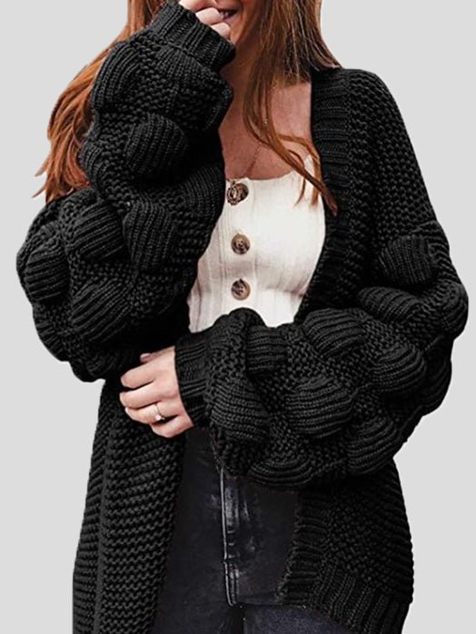 Women's chunky knit cardigan with pom pom sleeves and open front